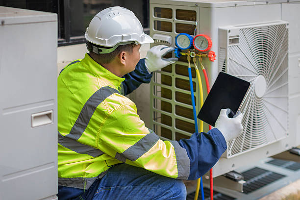 Professional Hvac technician working in Falmouth, MA
